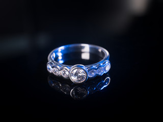 Jewel gemstone ring on black blackground