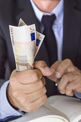 hands holding cash
