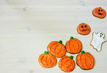 Funny delicious homemade ginger biscuits for Halloween on the table. horizontal view from above