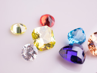 Jewel or gems on White shine color, Collection of many different natural gemstones 
amethyst,...
