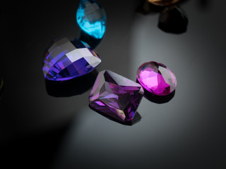 Jewel or gems on black shine color, Collection of many different natural gemstones 
amethyst,...