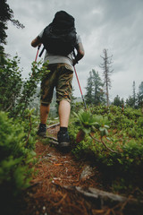 Adventure travel man in wildlife nature. Nature park Ergaki, Sib