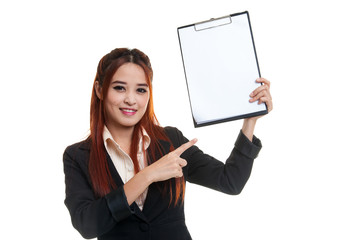 Young Asian business woman point to blank clipboard.