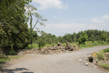 Mountain valley with volcano and road. Guatemala.