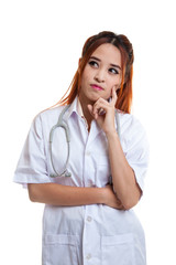 Portrait of Asian young female doctor thinking.