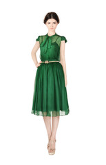 Girl in green, silk, old-fashioned clothes 
