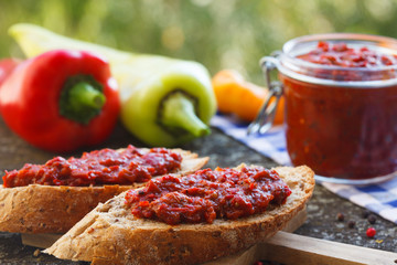 Ajvar - delicious dish of roasted red peppers spread on bread