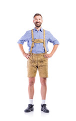 Man in traditional bavarian clothes, hands on hips