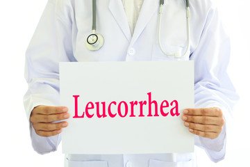 Doctor holding leucorrhea card in hands
