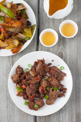 Spicy cumin lamb - traditional Uyghur dish  from Xinjiang region in China. Twice cooked pork - traditional Chinese dish from Sichuan region 