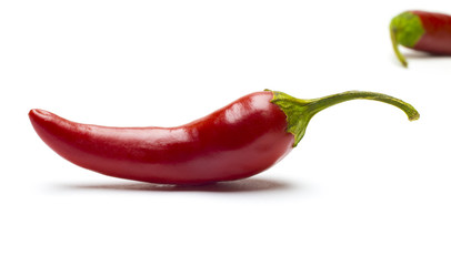 red chili or chilli cayenne pepper isolated on white background cutout
