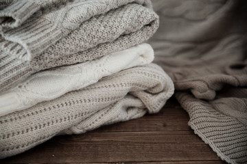 Fototapeta na wymiar stack of knitted sweaters