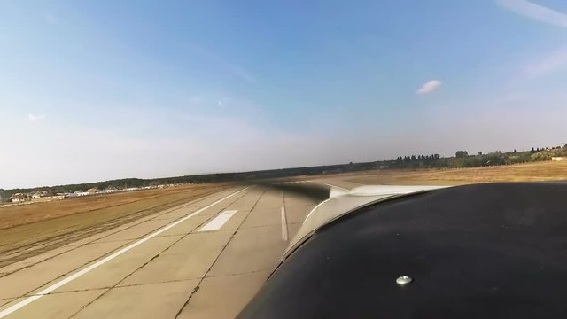 Propeller plane takeoff. View from cockpit.