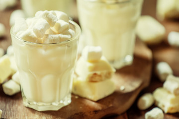 White liquid chocolate, selective focus