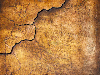 Obraz premium Closeup of the orange cement wall with crack background