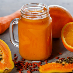 Papaya smoothie, selective focus. Detox, diet food.