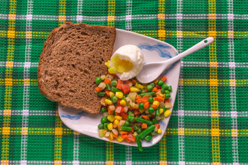 vegetables with boiled egg and bread