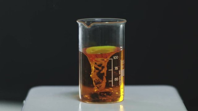 An artificial vortex in the beaker. Slow motion