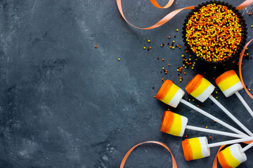 Candy corn marshmallow pops. Sweets and treats on Halloween party