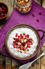 Coconut rice with pomegranate and granola