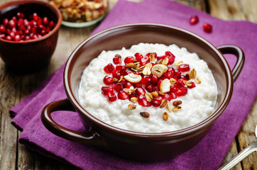 Coconut rice with pomegranate and granola