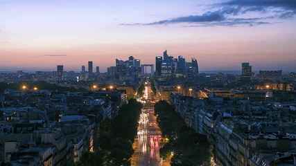 Fototapeten Sunset over Champs-Elysees and La Defense in Paris © Stockbym