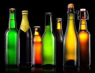 Set of beer bottles isolated on black background