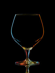 Silhouette of colorful whiskey glass with clipping path on black background