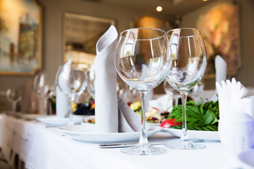Restaurant table with glasses and napkins