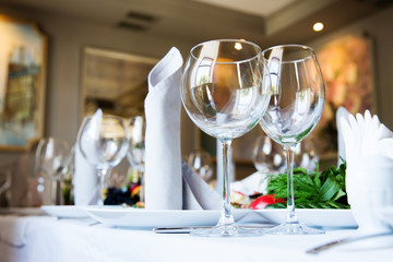 Restaurant table with glasses and napkins