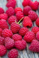 raspberry on wooden surface