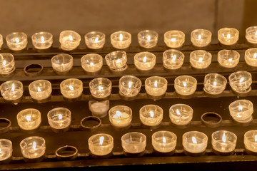 Group Of Candles In Church. Candles Light Background