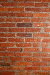 Old vintage orange and brown brick wall texture background with scratches