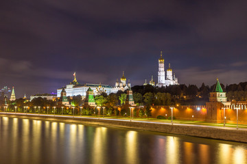Fototapeta na wymiar Moscow Kremlin, Ivan the Great Bell Tower, Grand Kremlin Palace and Moscow river at night with traffic trails. 