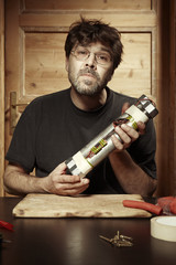 Terrorist finishing his pipe bomb