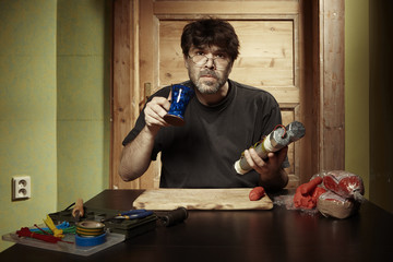 Extremist after completing tube bomb at home