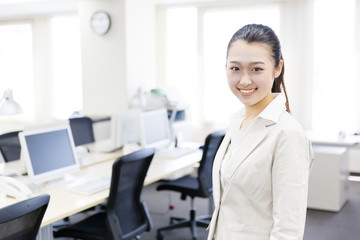 portrait of asian businesswoman relaxing in the office