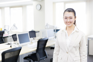 portrait of asian businesswoman relaxing in the office