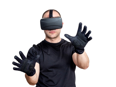 Man using virtual reality headset moving hands with gloves