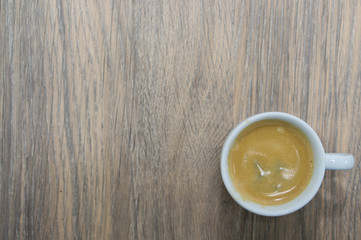 Espresso coffee woodden background