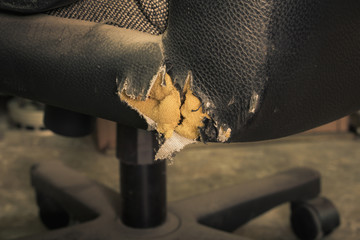 Torn leather seat