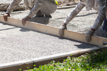 workers dub road sand and gravel