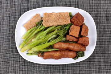 Chinese Vegetable festival  food as fried Kale with fermented flours. 