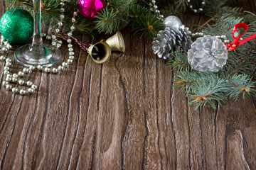 Fototapeta na wymiar Christmas frame. Christmas tree branches and Christmas bells on