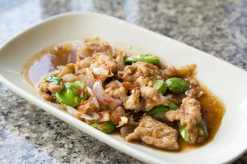 Thai food style. stir fried pork parkia with shrimp.