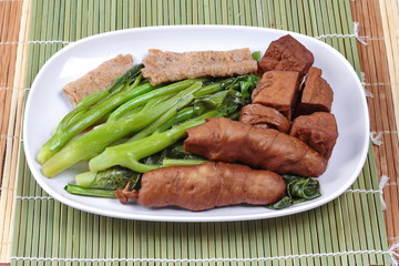 Chinese Vegetable festival  food as fried Kale with fermented flours. 