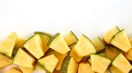 Hamigua Melon cut into slices, Hami Melon, Hami Cantaloupe isolated on white background.
