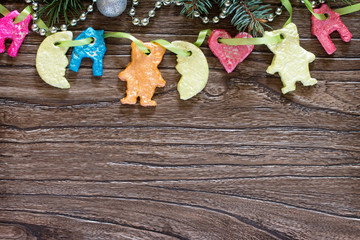 Christmas frame. Christmas tree branches and Christmas toys made