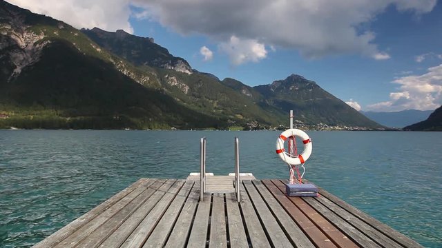 Achensee ( Lake Achen) wooden stairway on lake (Austria).