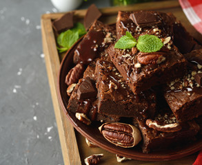 Delicious chocolate brownie with pecan